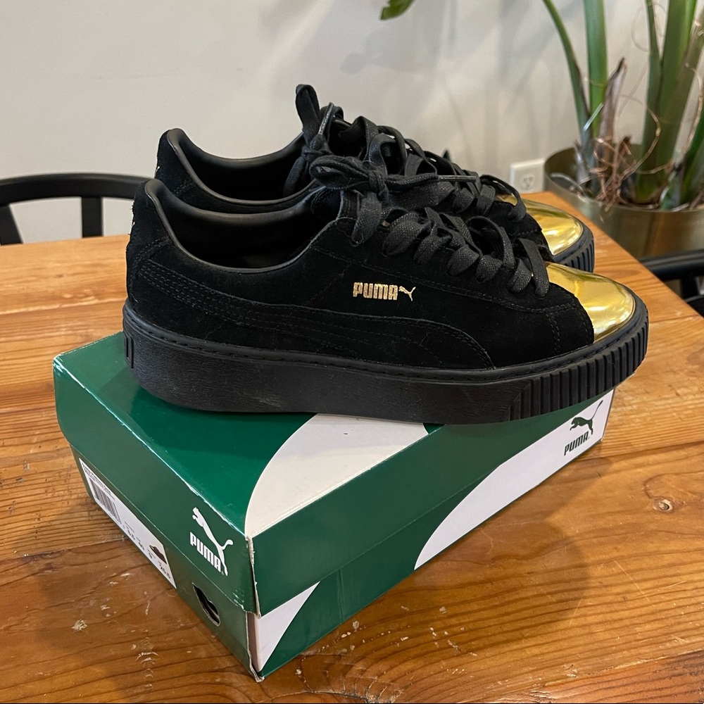 Puma Black Suede Sneakers with Metallic Gold Toe